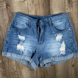 Size Small SHEIN lightweight high waist denim short. Distressed. Never worn.